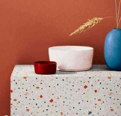 wrap folie terrazzo op muur aangebracht